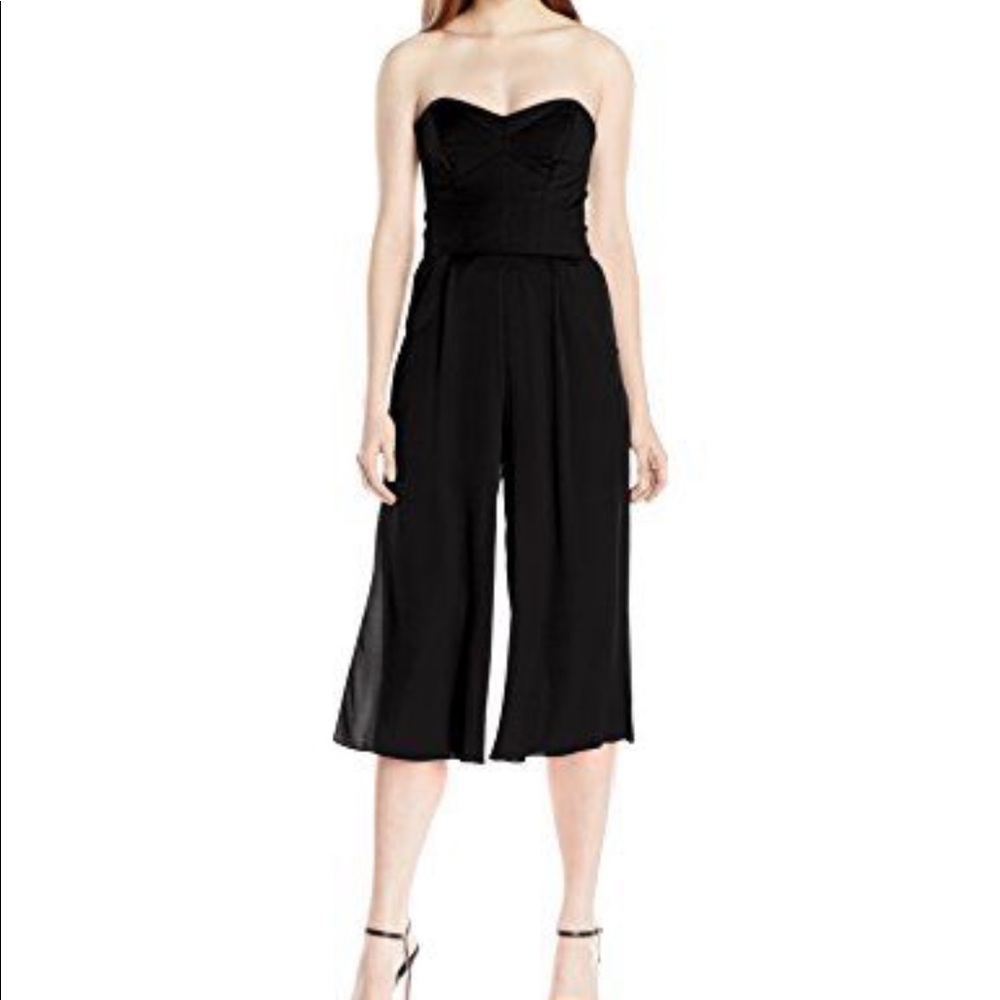 Strapless silk culottes jumpsuit with pockets.